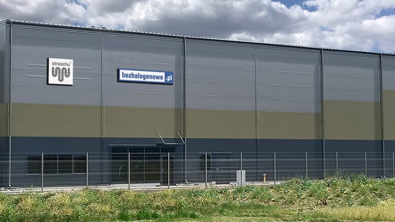 Ein neues großes graues Gebäude.